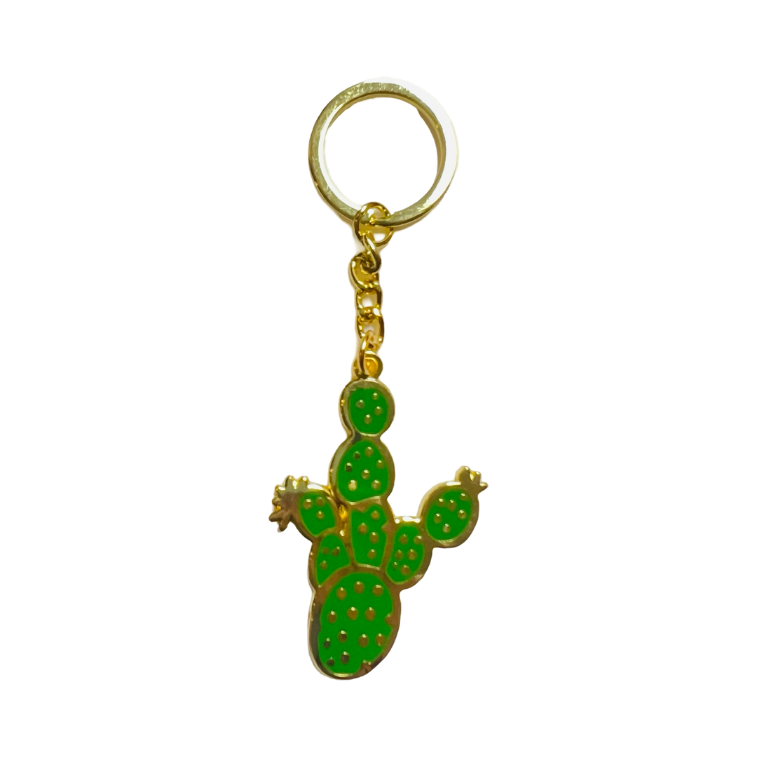 green enamel cactus keychain with a gold ring.