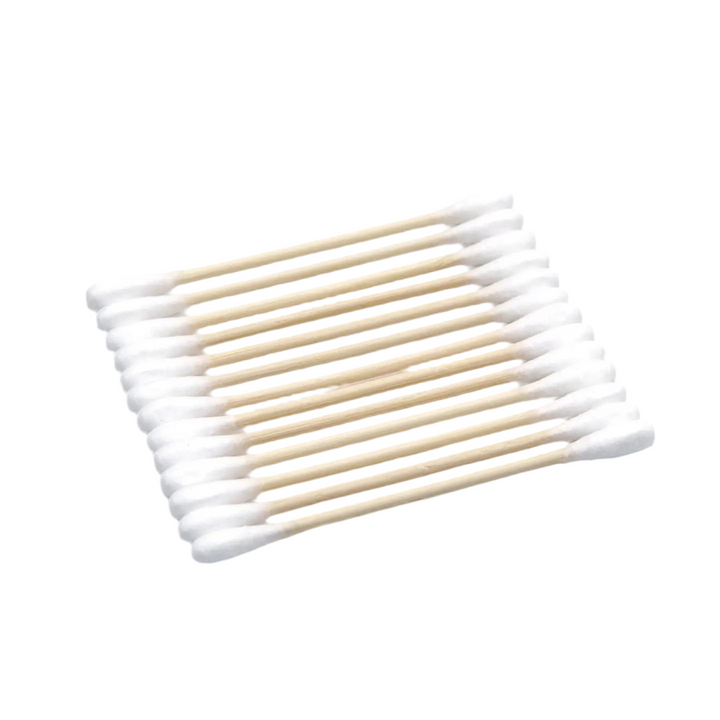 13 white and tan cotton swabs lined up side by side