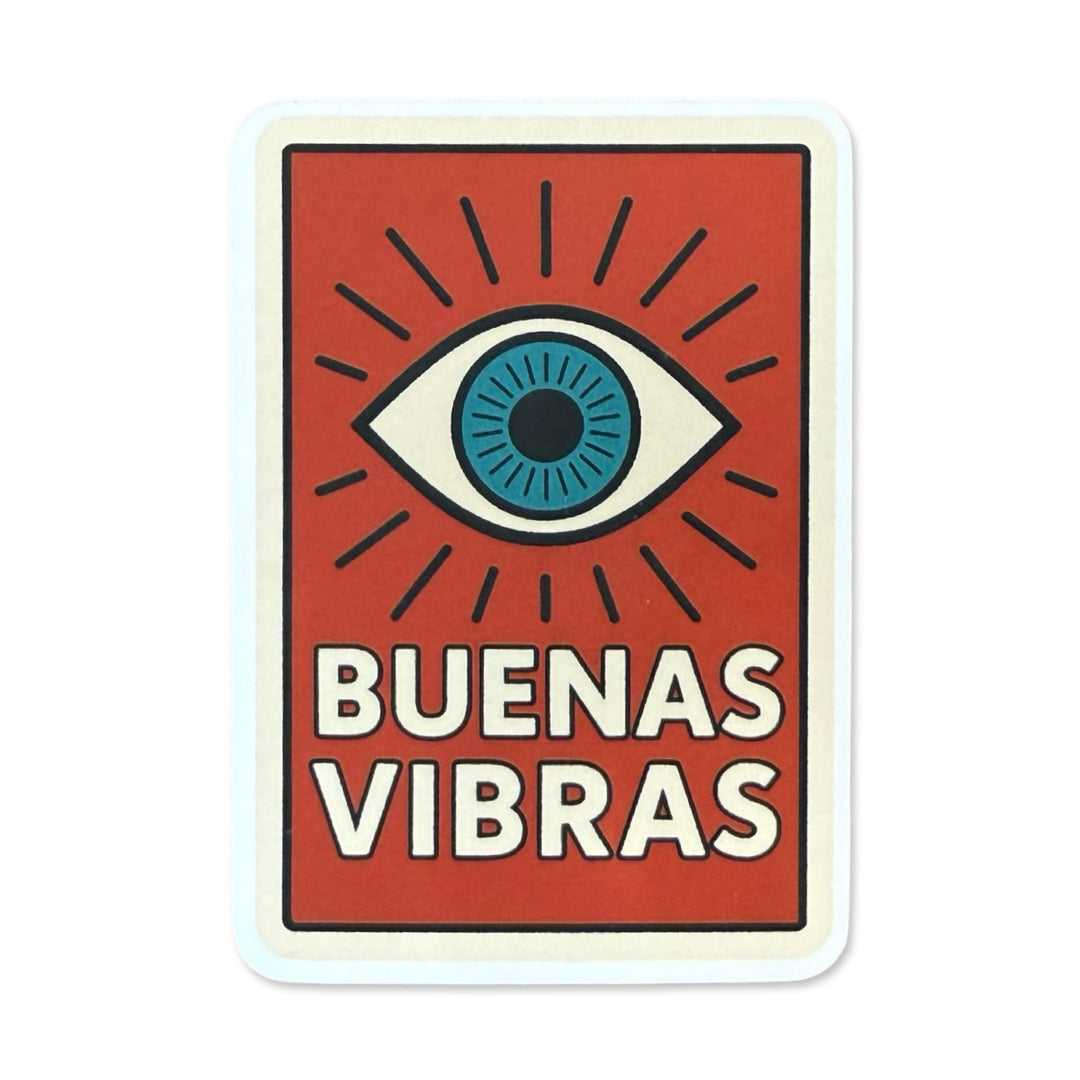 Sticker with a bold brick red background featuring a stylized blue eye radiating black lines above the phrase “BUENAS VIBRAS” in white block letters.