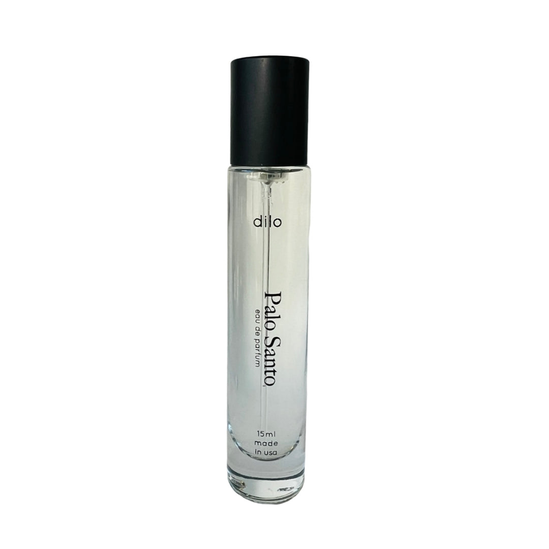 15ml clear perfume roller and black lid with the phrase palo santo in black lettering.