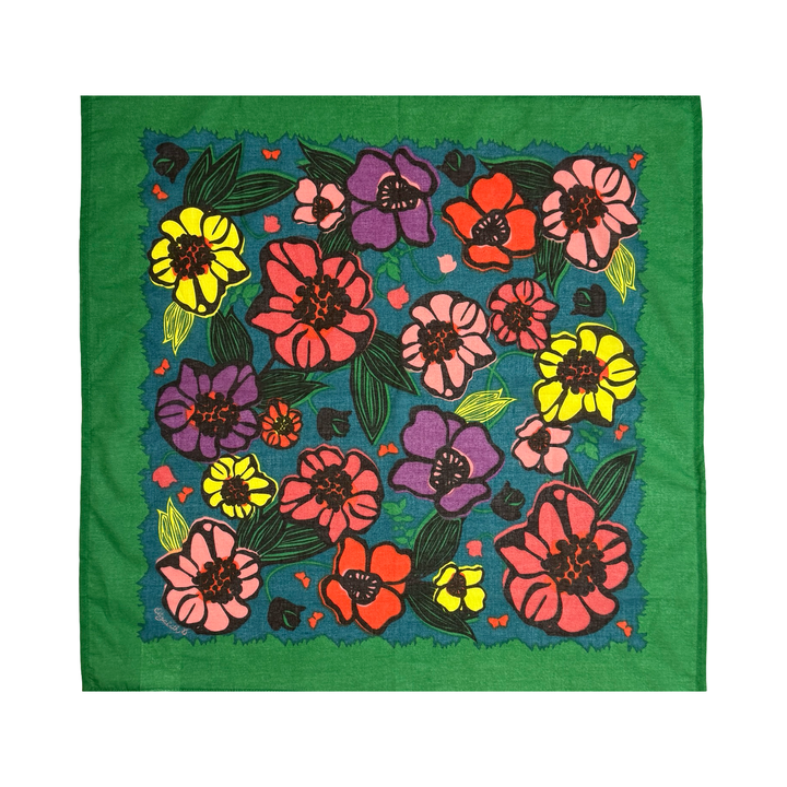 Colorful cotton handkerchief with a bold floral pattern in red, purple, yellow, and green tones.