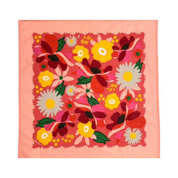 Cotton handkerchief with a vibrant floral print in pink, red, yellow, and green tones,