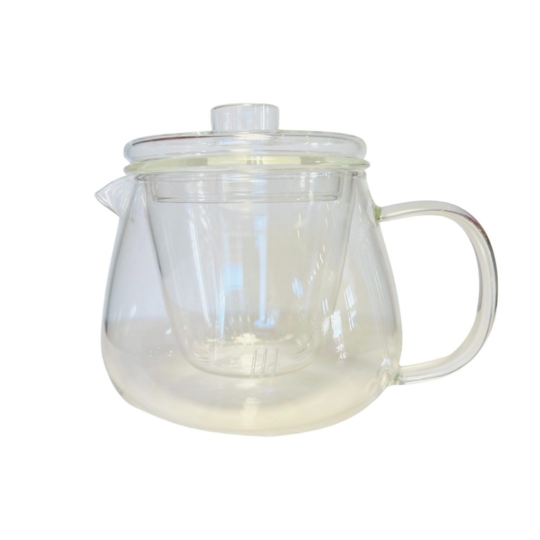 Clear glass teapot with an infuser