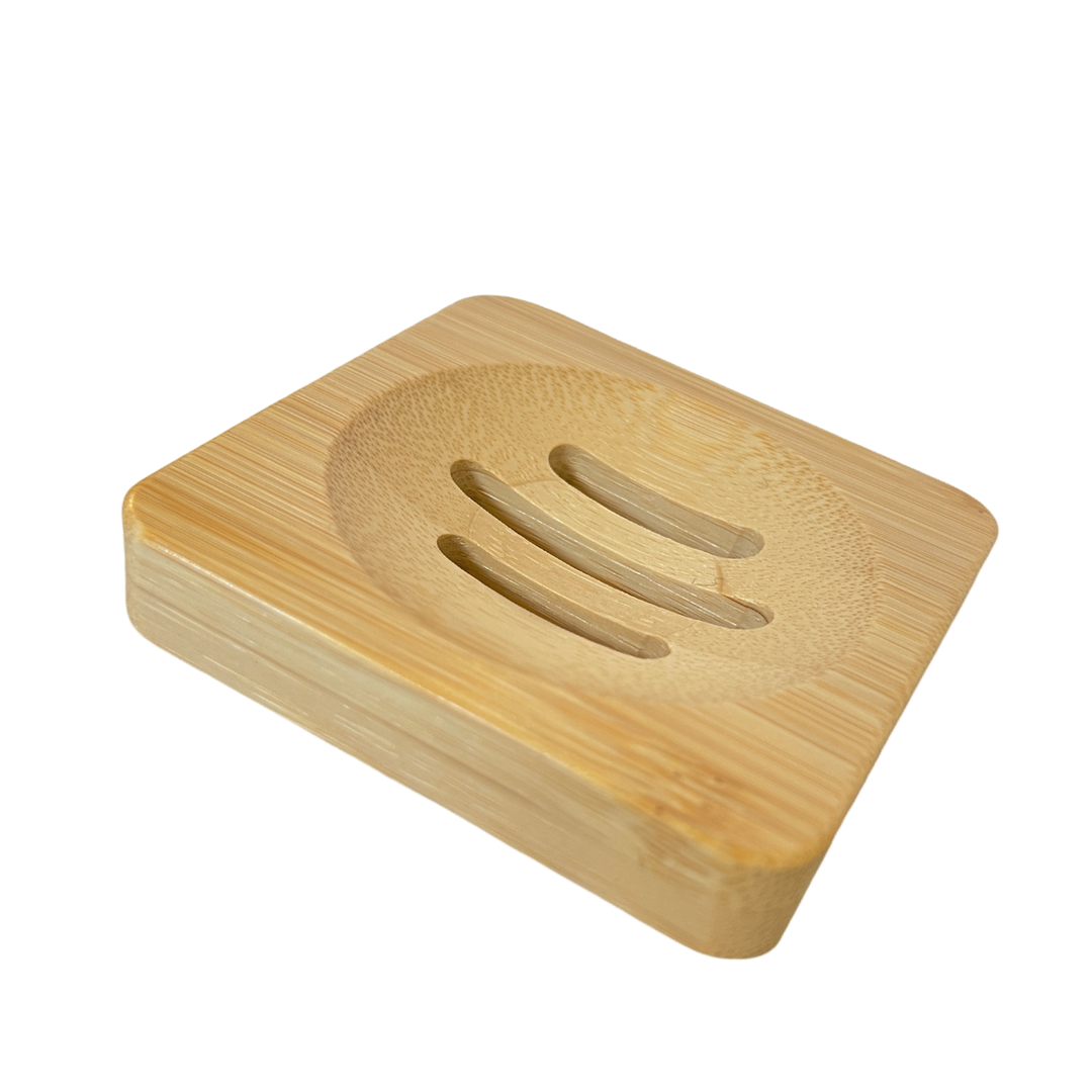 side view of a Square wooden soap dish made from bamboo, featuring a recessed center with three drainage slots