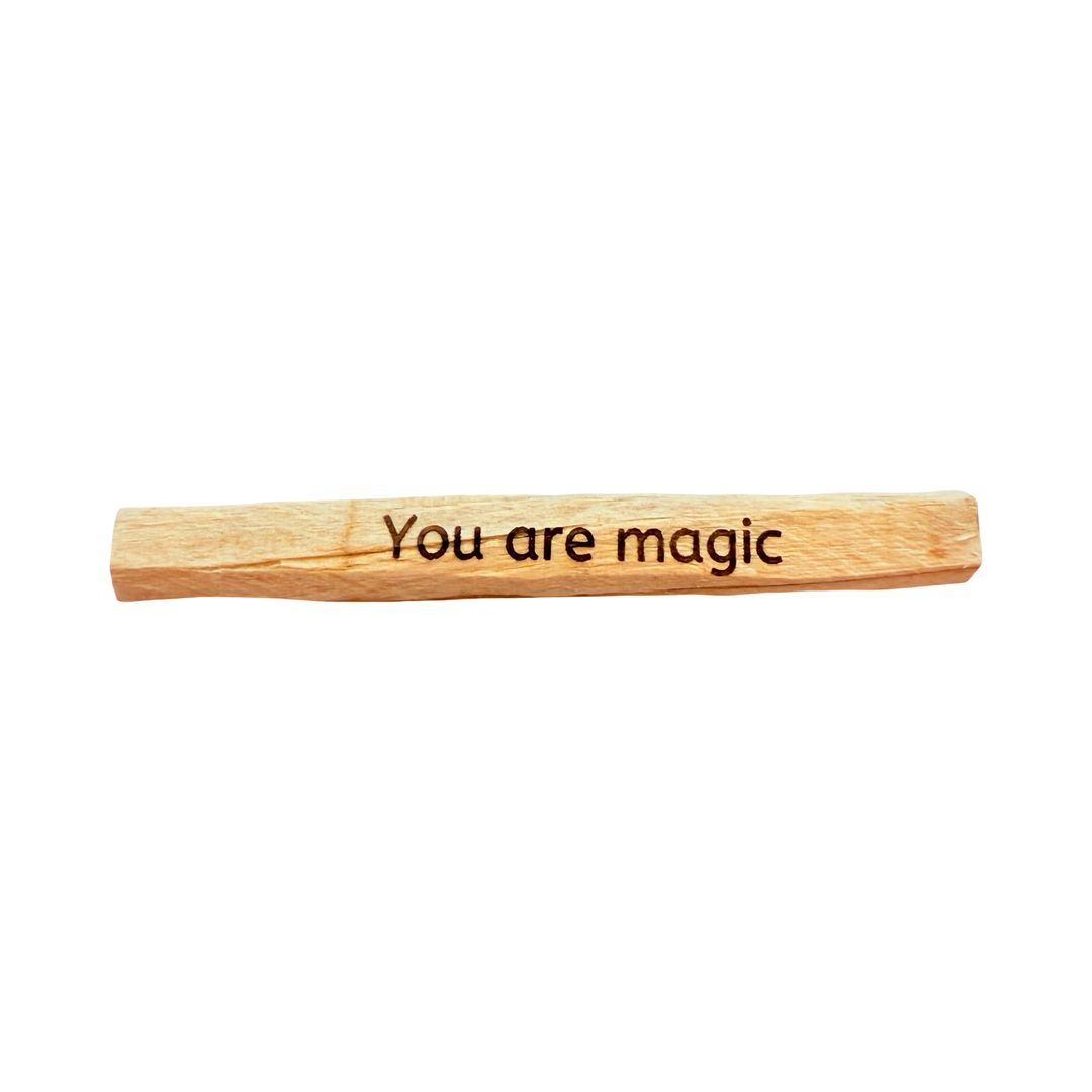 palo santo stick engraved with the phrase you are magic