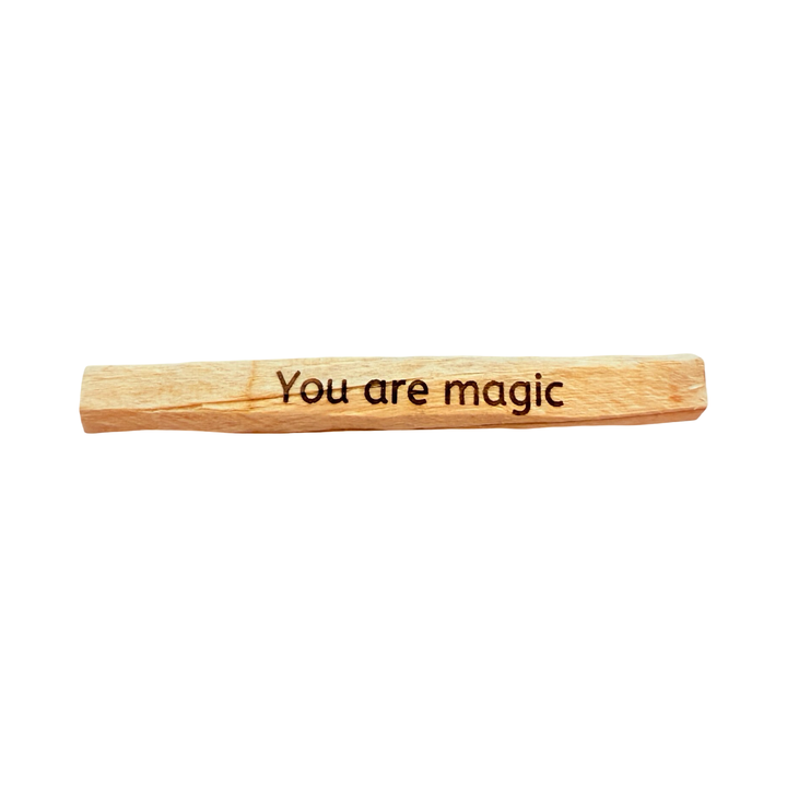 palo santo stick engraved with the phrase you are magic