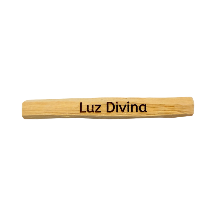 palo santo stick engraved with the phrase Luz Divina - Divine Light.