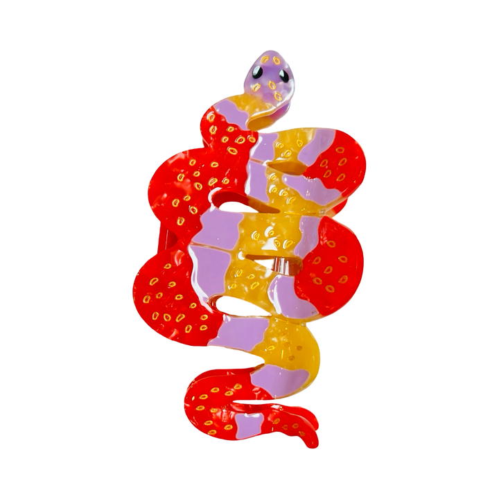 orange, pink and red patterns with golden accents hand painted snake hair claw clip.
