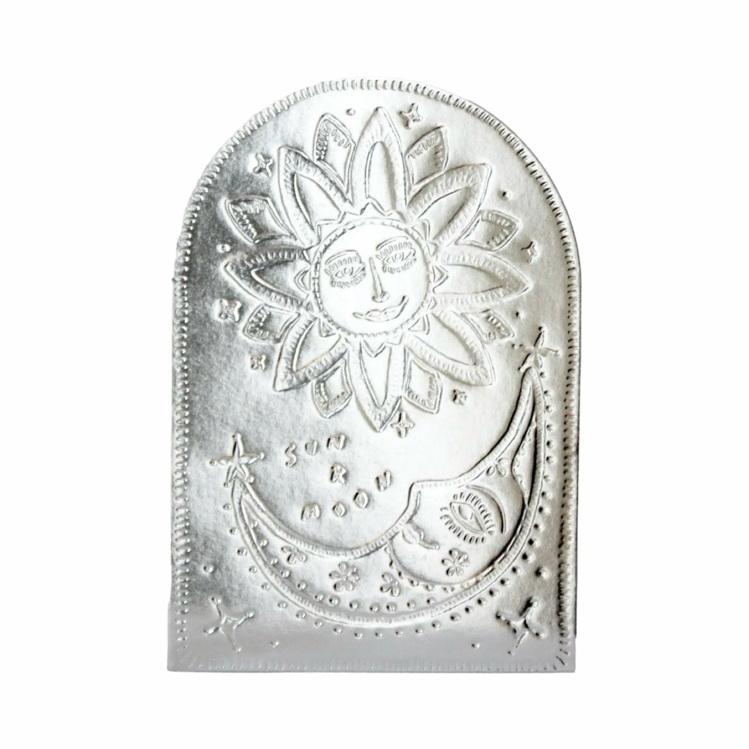 faux tin greeting card featuring a sun and moon design