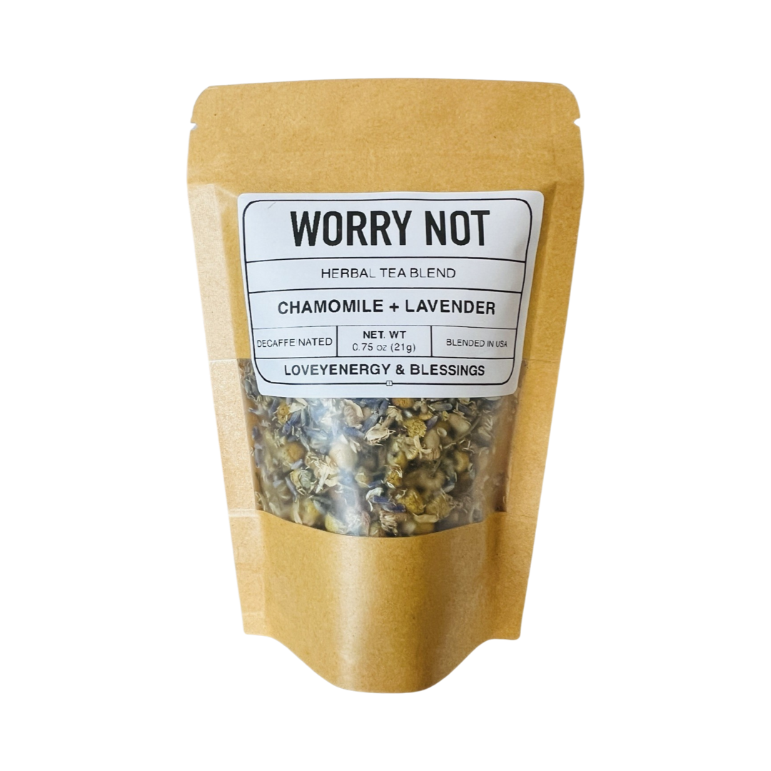 .75 oz  kraft pouch of tea featuring dried chamomile and lavender with a white branded label. Brand: Loveyenergy & Blessings
