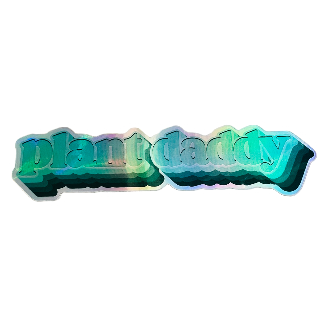 GREEN AND SILVER HOLOGRAPHIC STICKER OF THE PHRASE PLANT DADDY