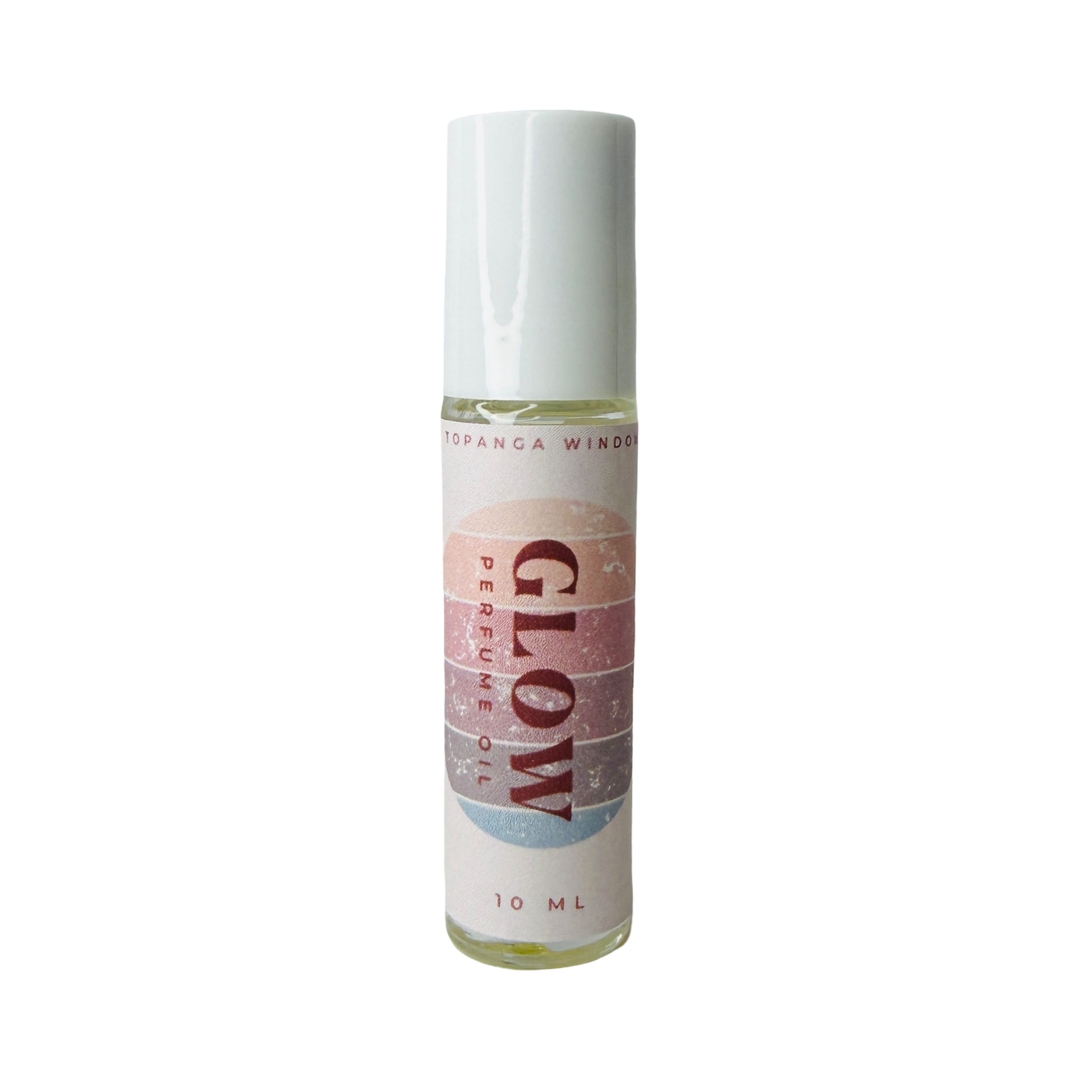 10 mil glass tube of perfume oil with a pastel branded label. Brand: Topanga Window
