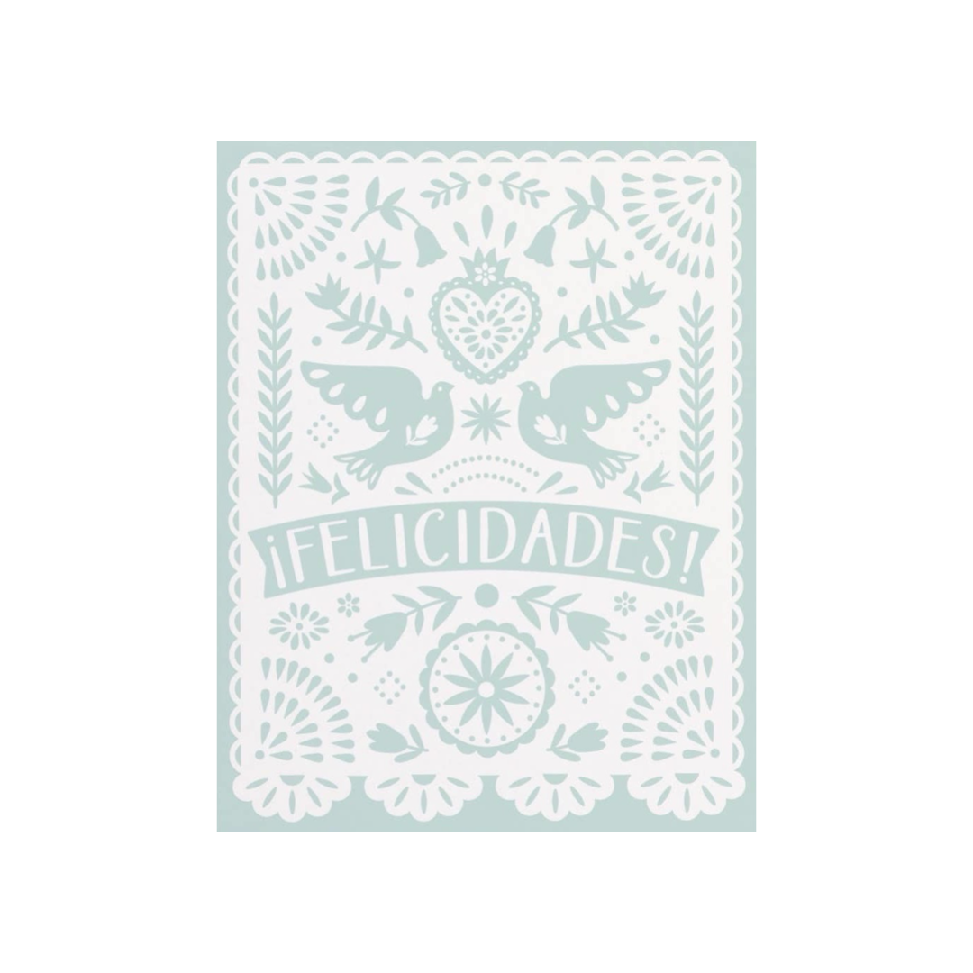 sage colored card with a white papel picado inspired design that features a heart, two doves, flowers and the phrase Felicidades.