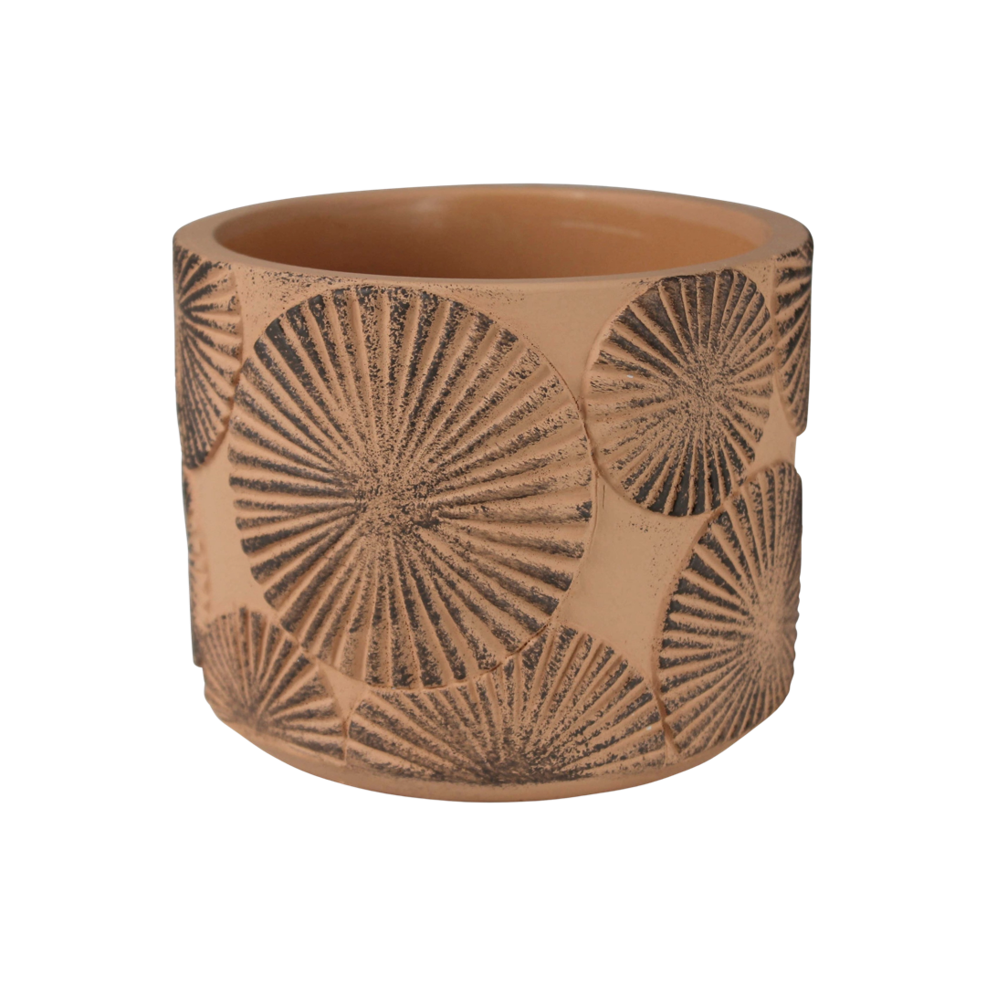 blush pink cement cache pot with a sunburst design