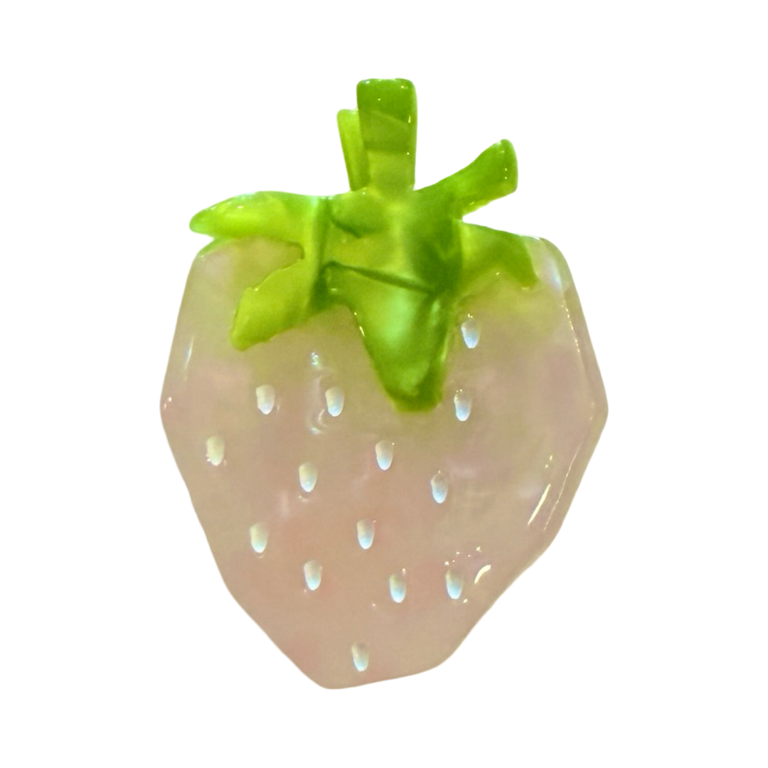 Photo of mini hair clip resembling a young pink strawberry