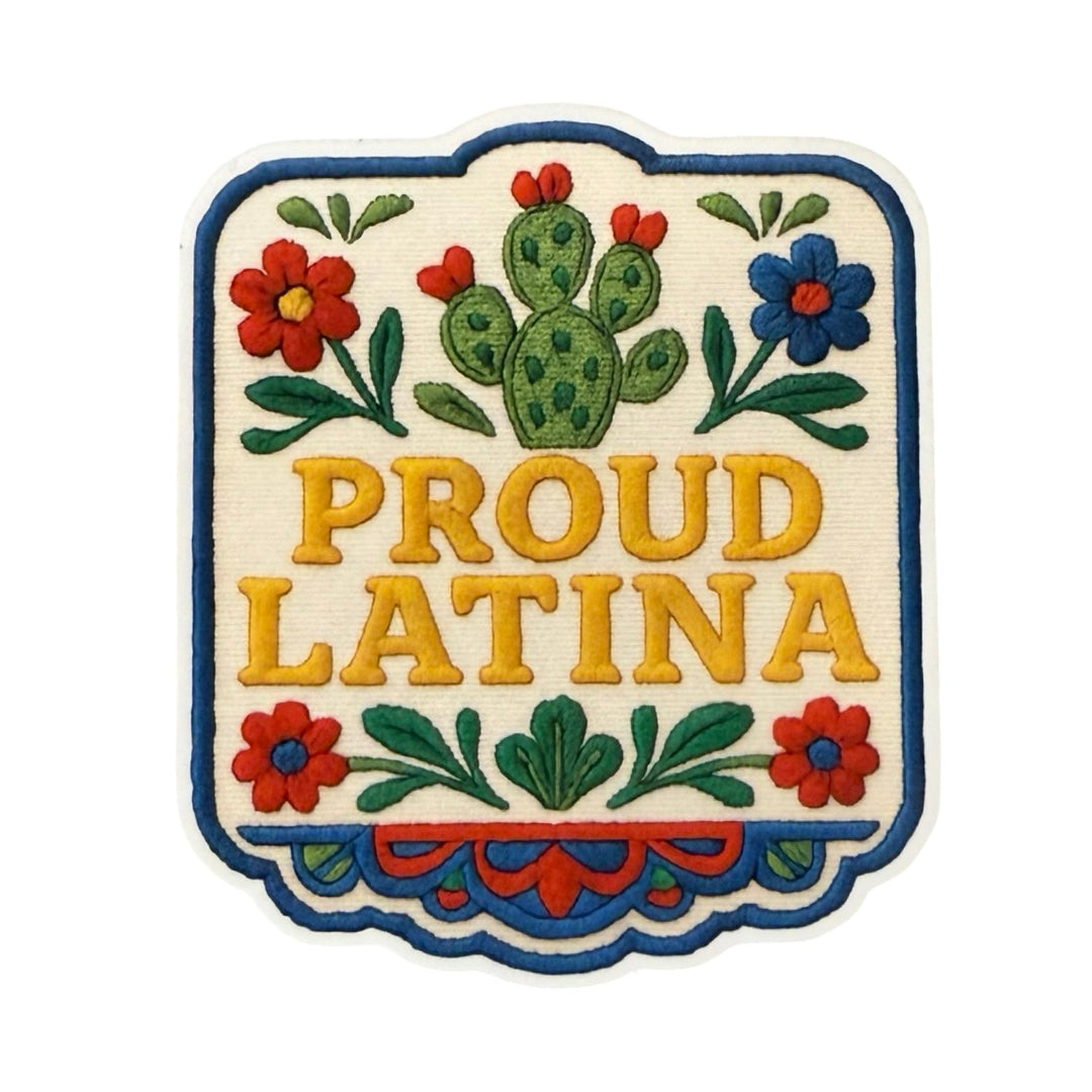 Sticker with the phrase "Proud Latina" in bold yellow letters, surrounded by colorful flowers and a green nopal cactus, inspired by traditional Mexican folk art.