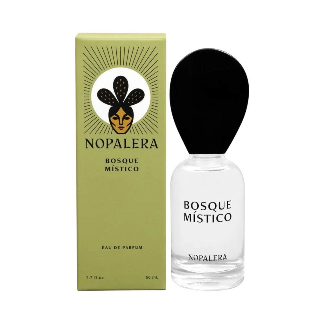 clear 50ml jar with a black top flanked by a sage green branded box of Bosque Mistico Nopalera perfume