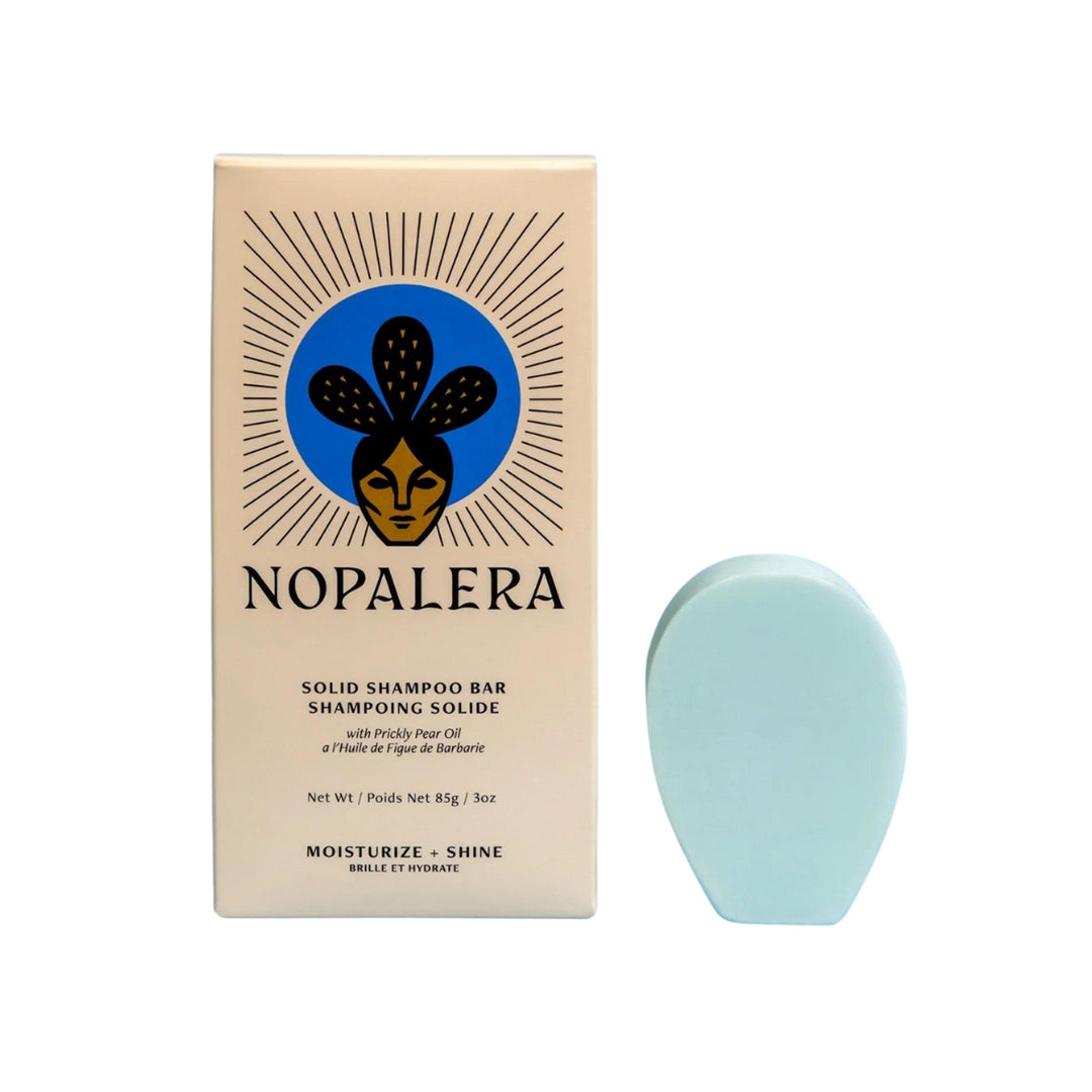 Photo of a paddle shaped solid shampoo bar from the brand, Nopalera