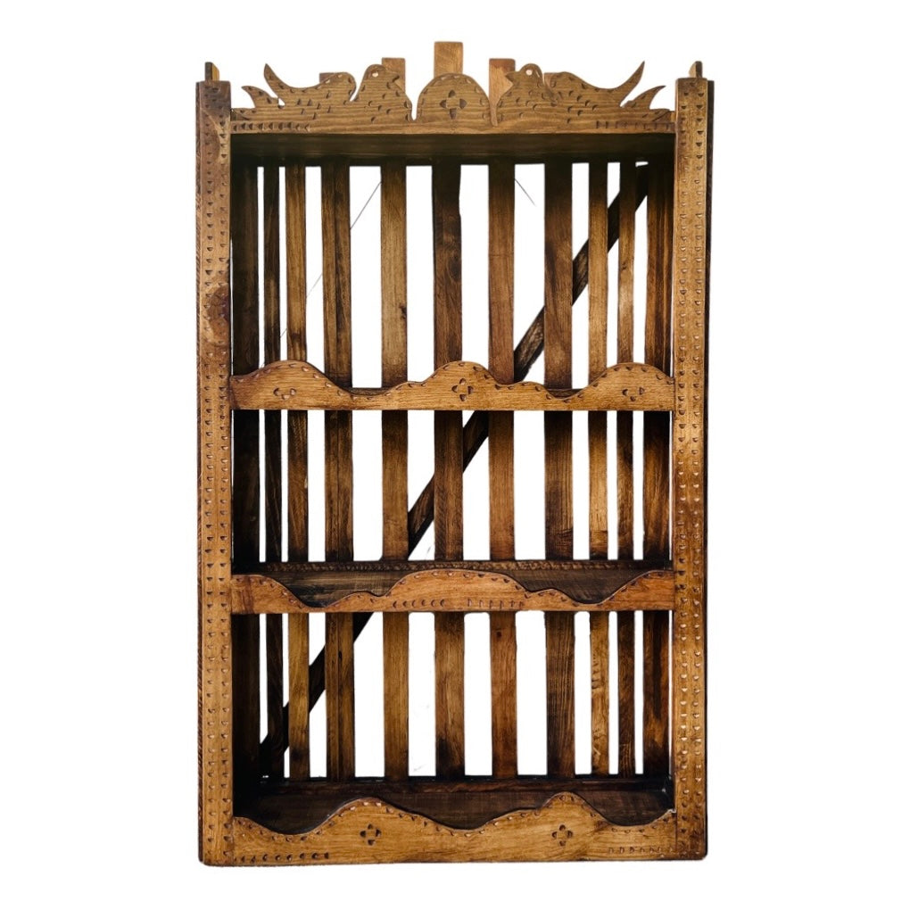 Wooden shelf with a dark stain that features two birds on the top