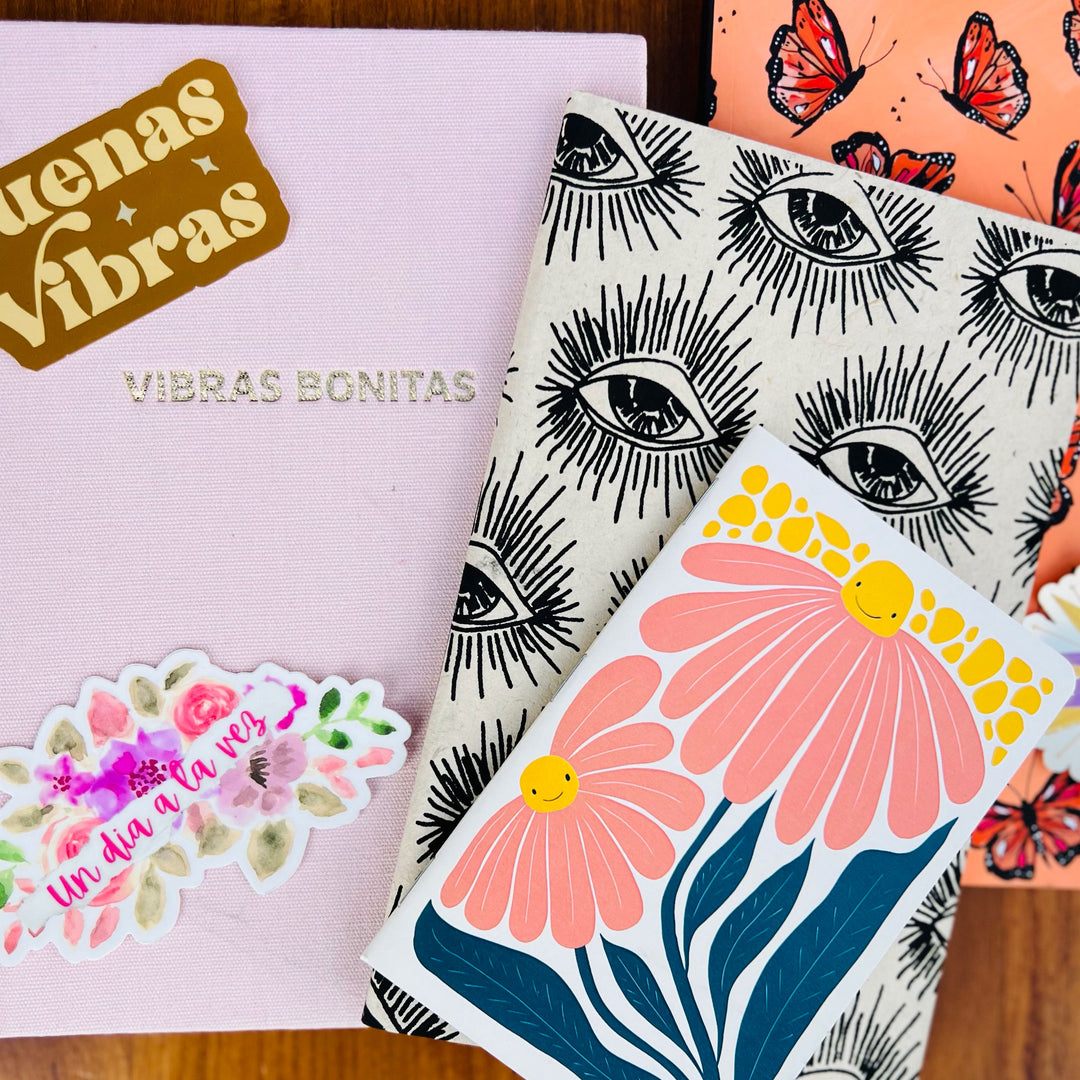 Photo of assorted journals & stickers