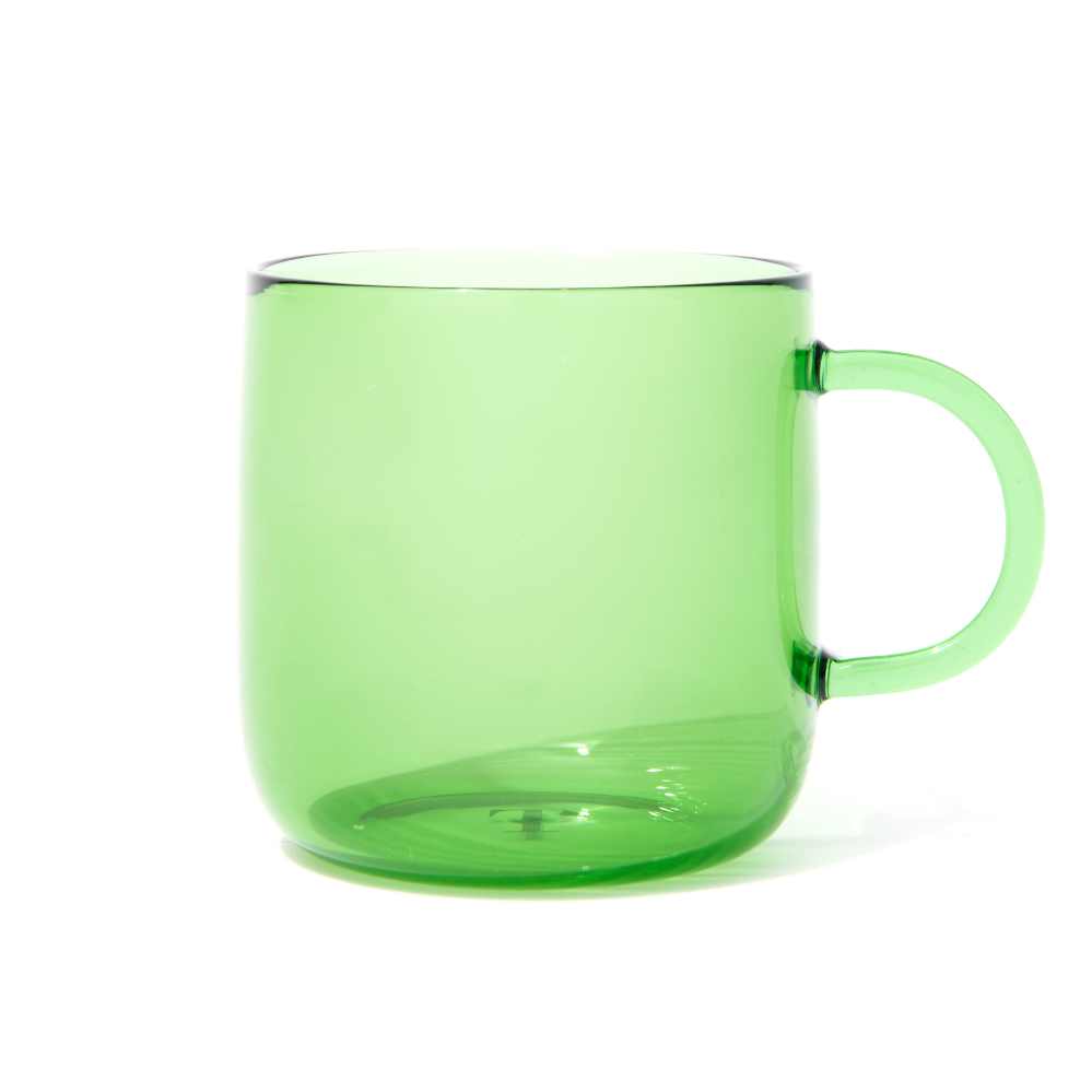 Green colored glass mug with a handle