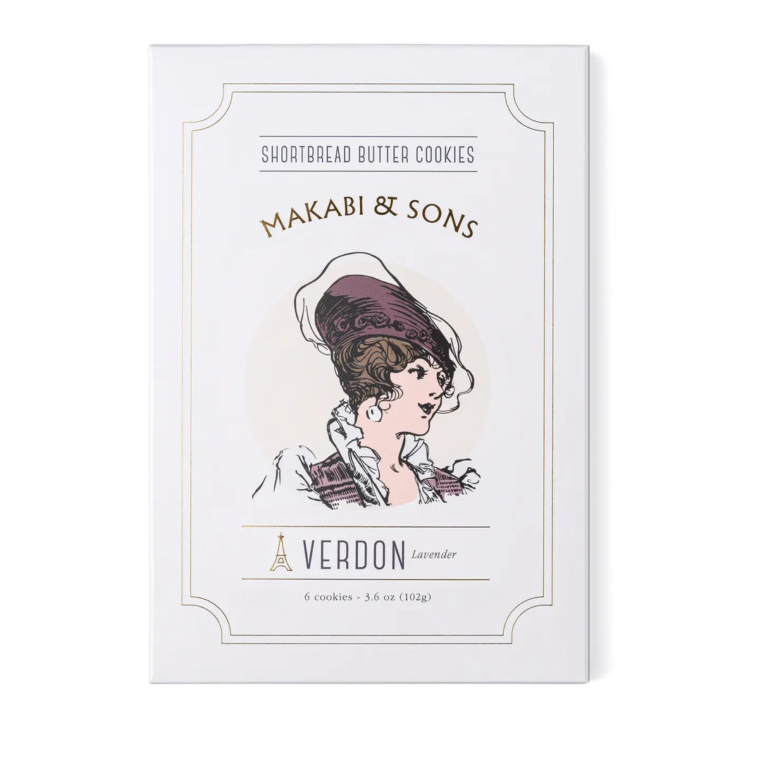 A box of Makabi & Sons Verdon Shortbread Butter Cookies, featuring a vintage-style illustration of a woman in elegant attire. The packaging highlights the lavender-flavored cookies inside.