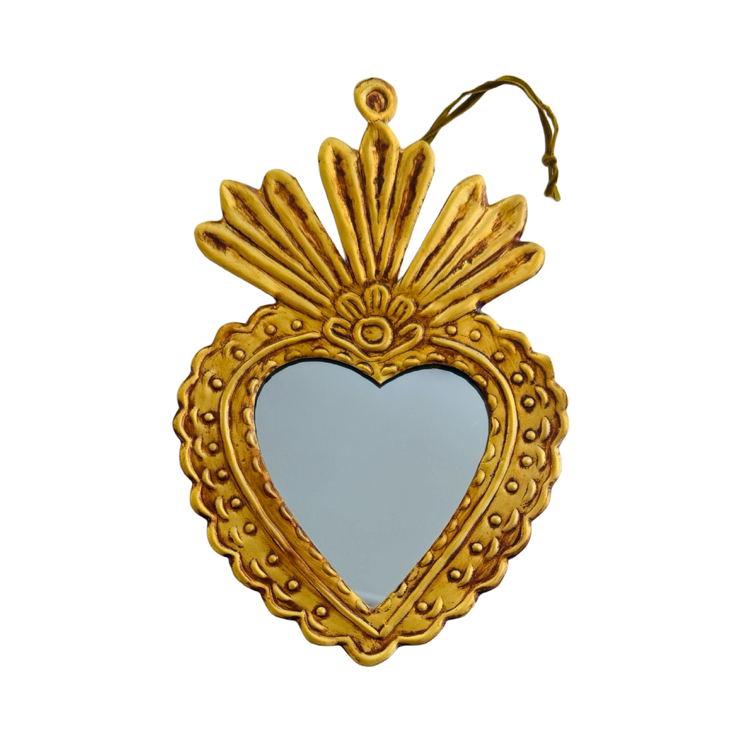 Medium-sized gold-toned Sacred Heart mirror with embossed details.