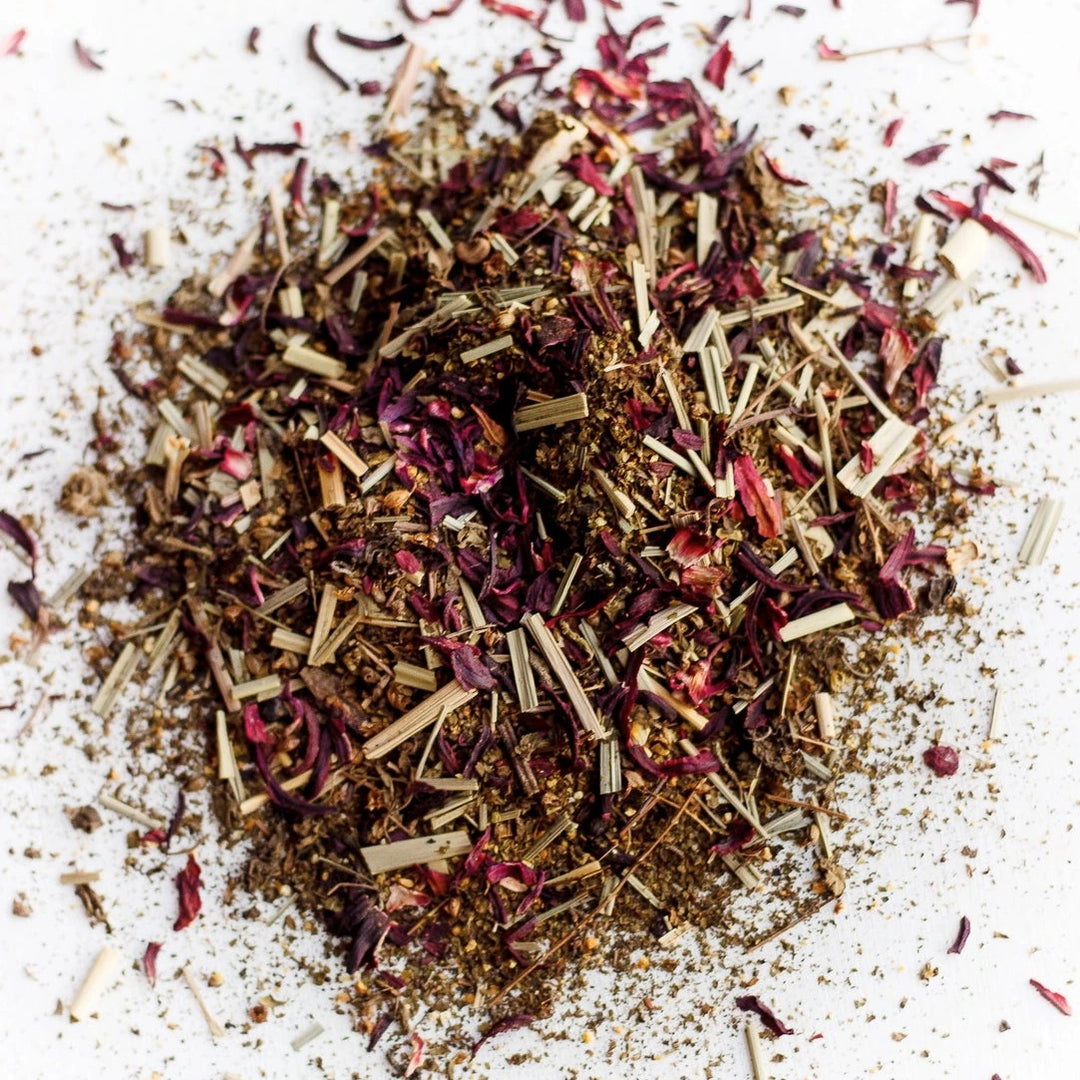 close up view of hibiscus tea leafs and flowers.