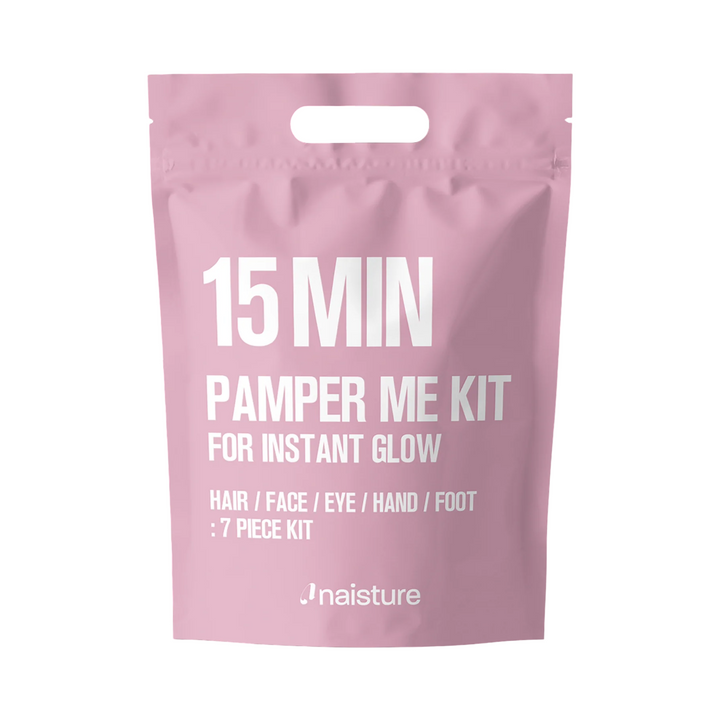 Pink '15 Min Pamper Me Kit' packaging with white text on a white background