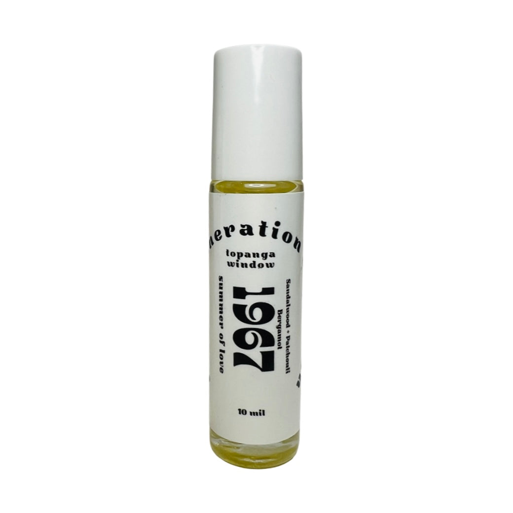 10 mil glass tube of perfume oil with a white branded label. Brand: Topanga Window