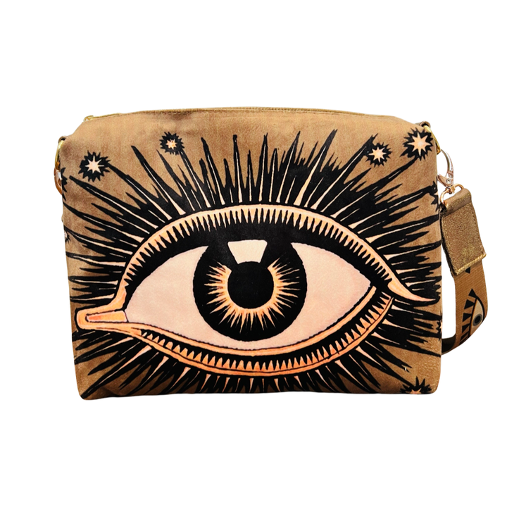 brown bag with an image of an eye featuring eyelashes and stars