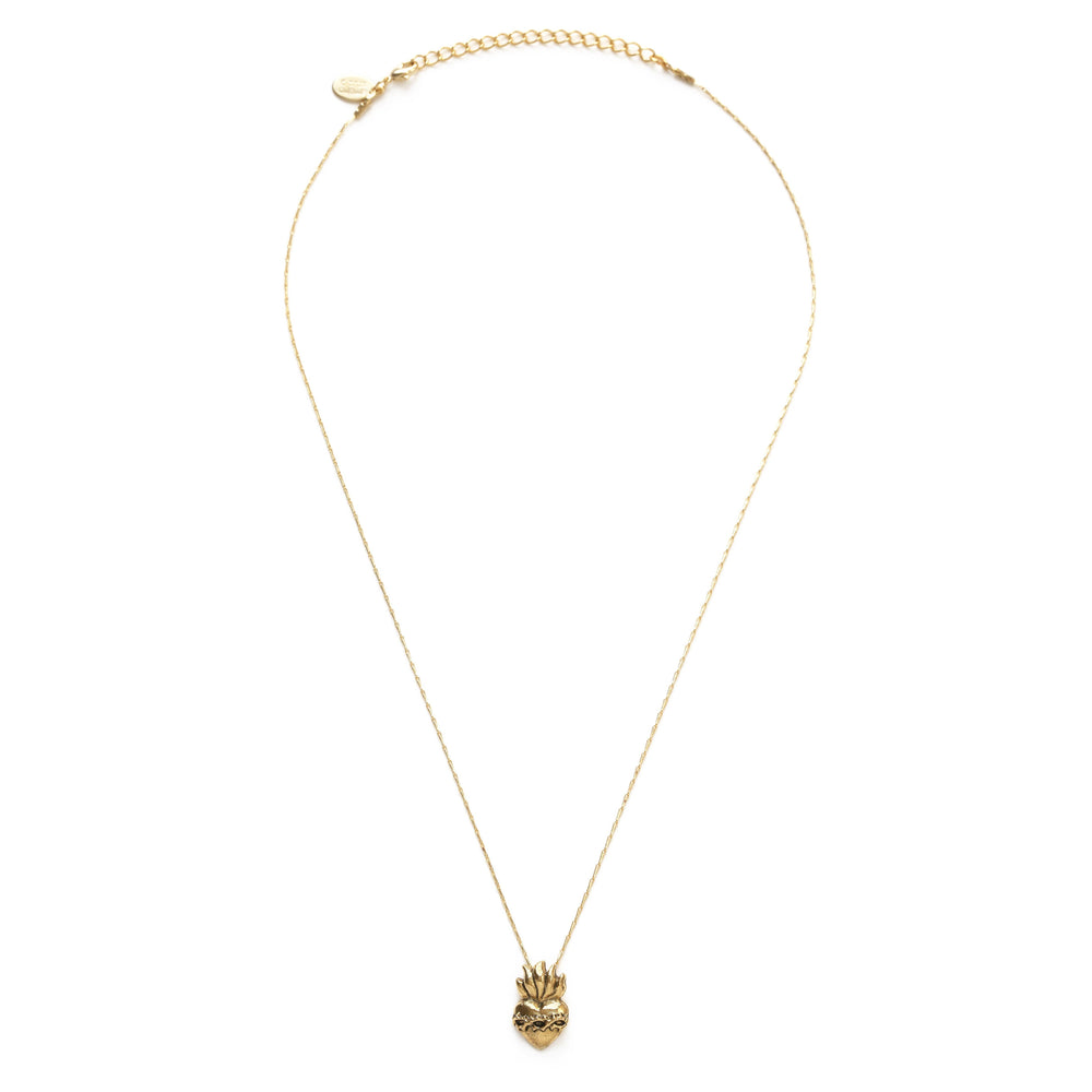 a gold sacred heart pendant necklace with a gold chain. Brand: Amano Studio