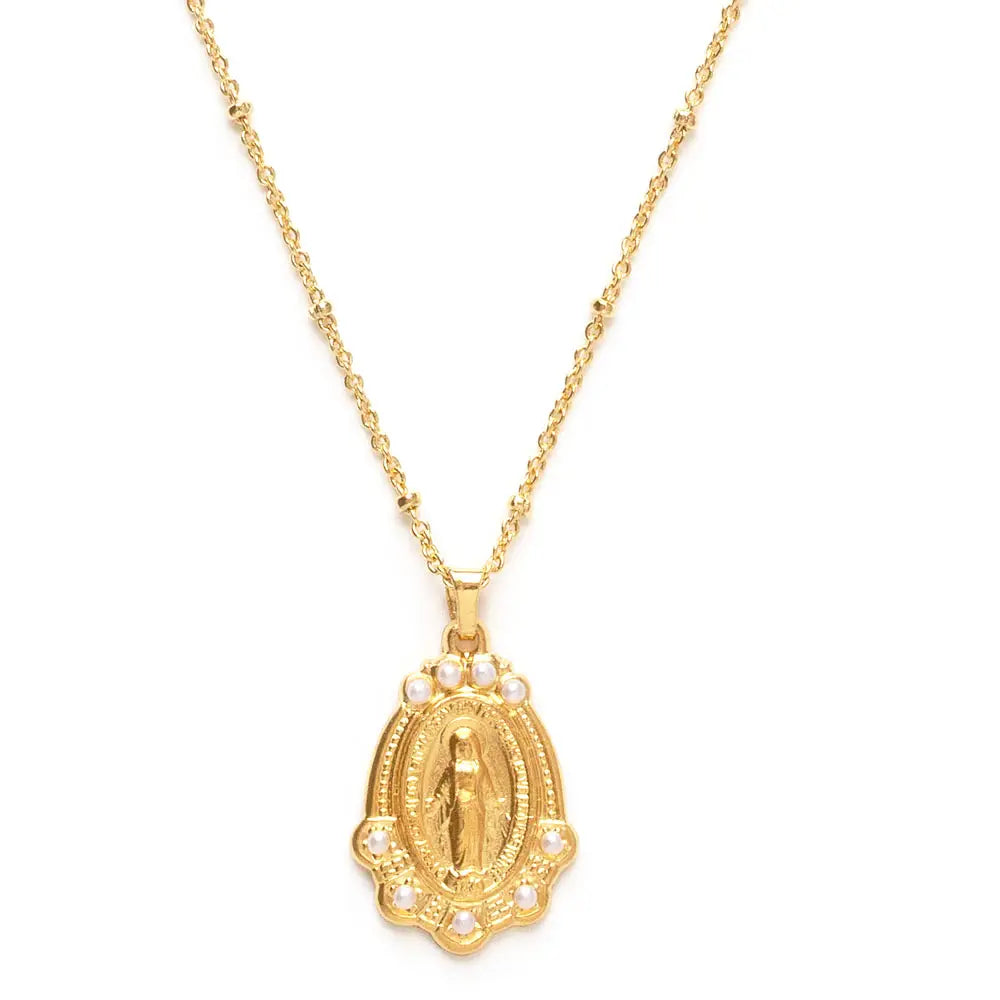 close up view of Virgin Mary Medallion with pearl accents on a gold chain