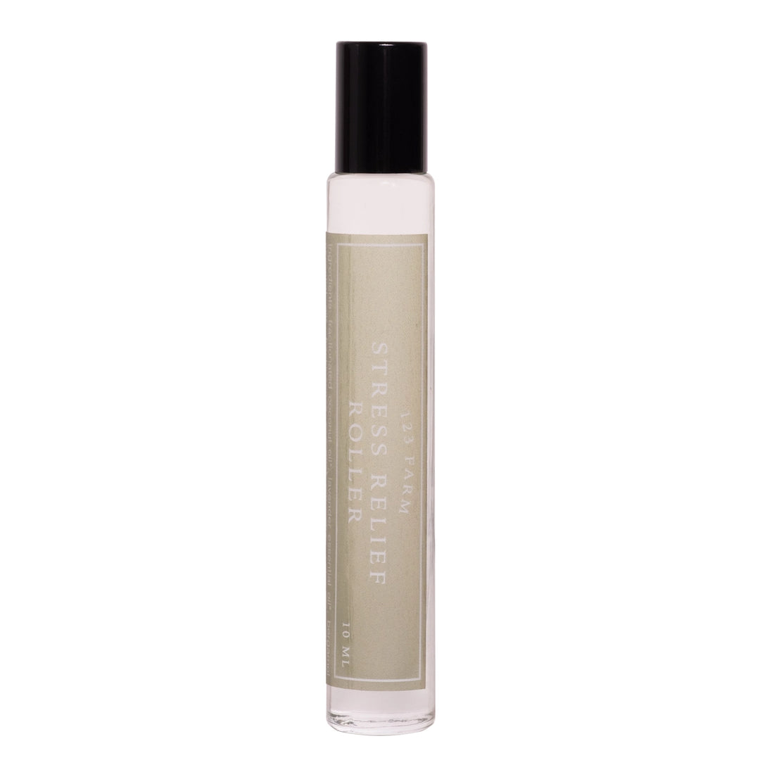 10ml Stress Relief Roller in a slim glass bottle with a black cap and sage green label.