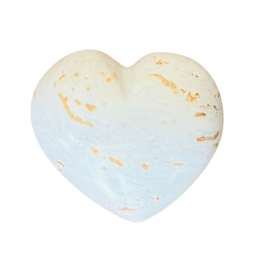 single white stone heart with light brown speckles