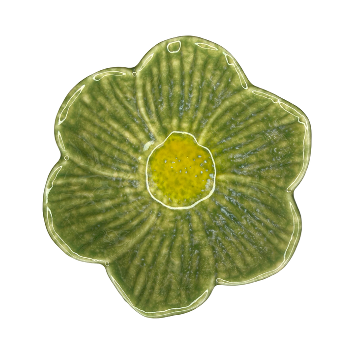 Stoneware flower-shaped bowl in dark green with a golden center glaze.