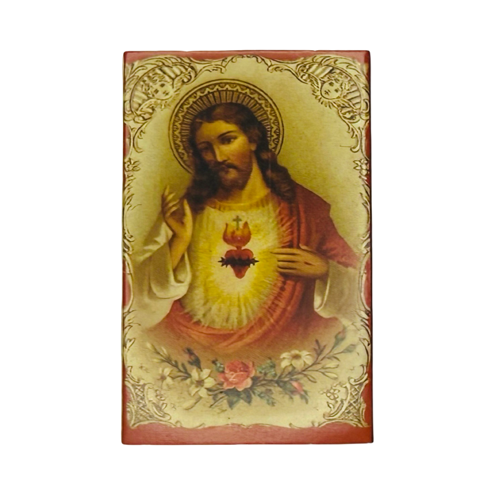 Matchbox with Sacred Heart of Jesus, halo, and flowers.