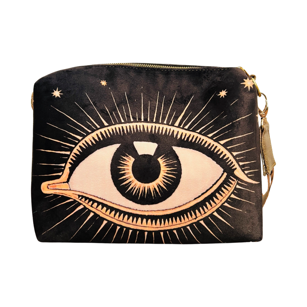 black bag with an image of an eye featuring eyelashes and stars