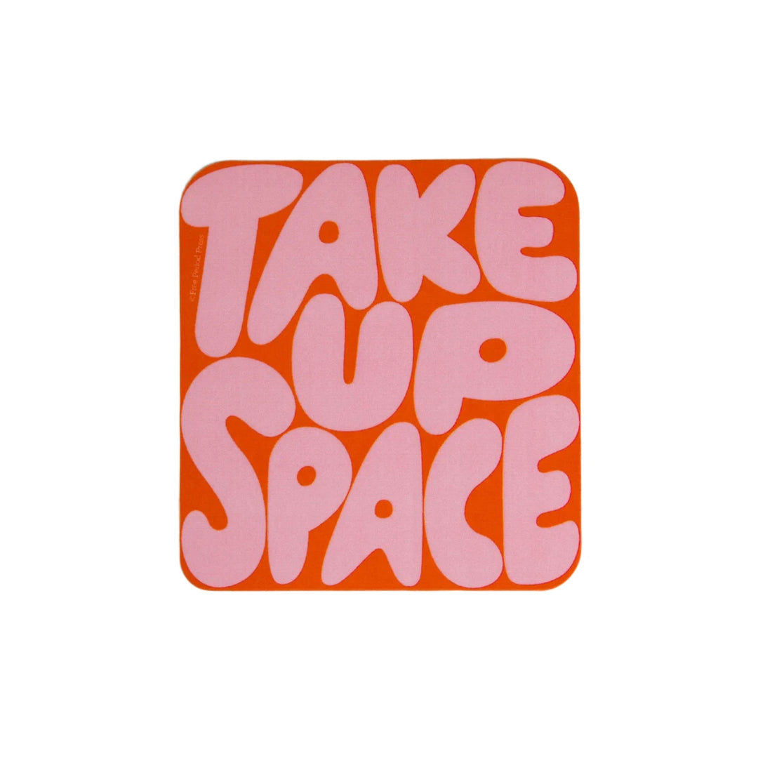 A square sticker with rounded edges featuring the phrase "Take Up Space" in large, bubblegum pink letters on a bright orange background.