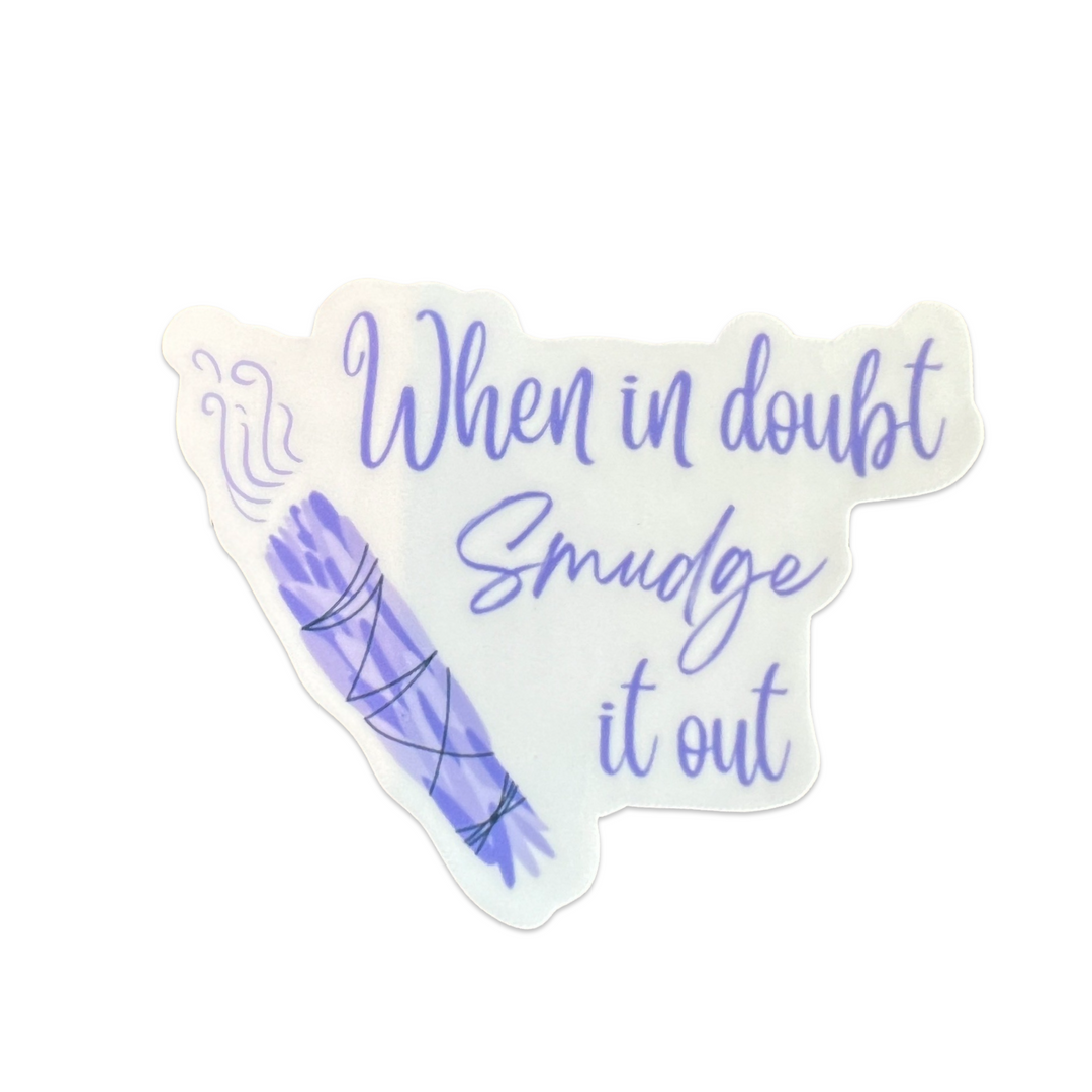 white sticker with the phrase When in Doubt smudge it out in purple lettering and an illustration of a purple sage bundle.