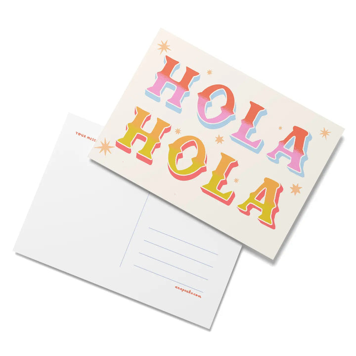 A colorful postcard with the word “HOLA” repeated twice in bold, retro-style letters in shades of pink, blue, orange, and yellow, surrounded by small stars. The back of the postcard is blank with space for a message, address, and stamp.