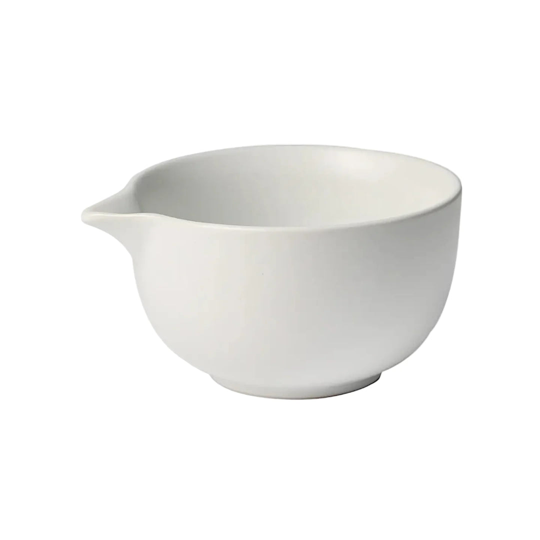 white stoneware matcha bowl with a spout