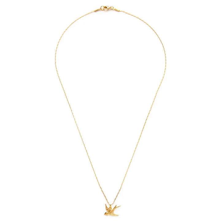 gold swallow charm on a gold chain