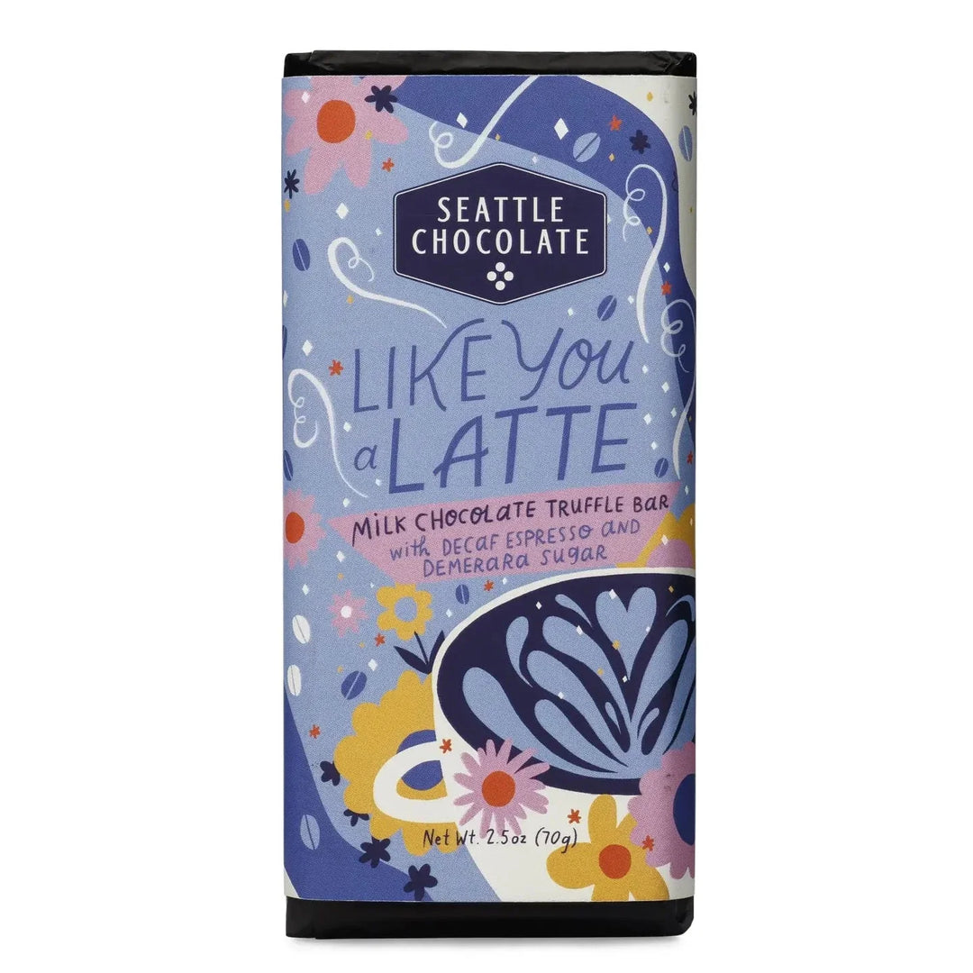 Milk Chocolate Truffle Bar with a purple label that features multi-colored flowers and a latte.