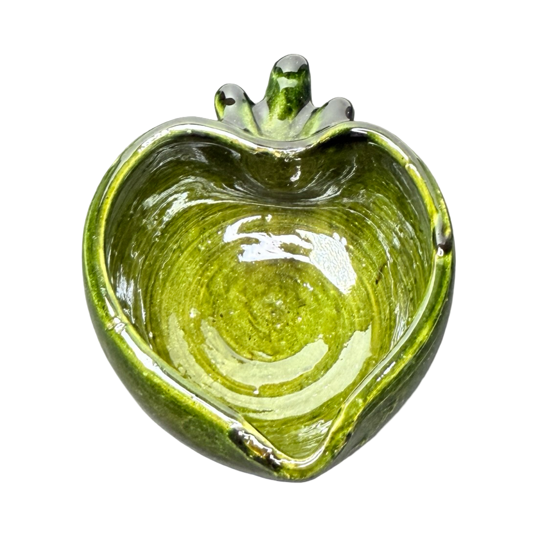 Green ceramic heart-shaped bowl with a glossy glaze