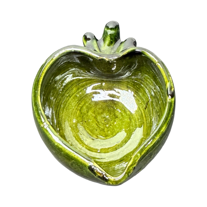 Green ceramic heart-shaped bowl with a glossy glaze