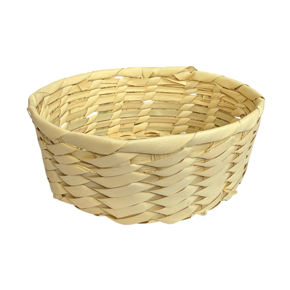 side view of a handwoven natural palm leaf basket with a rectangular shape and diagonal weave pattern.