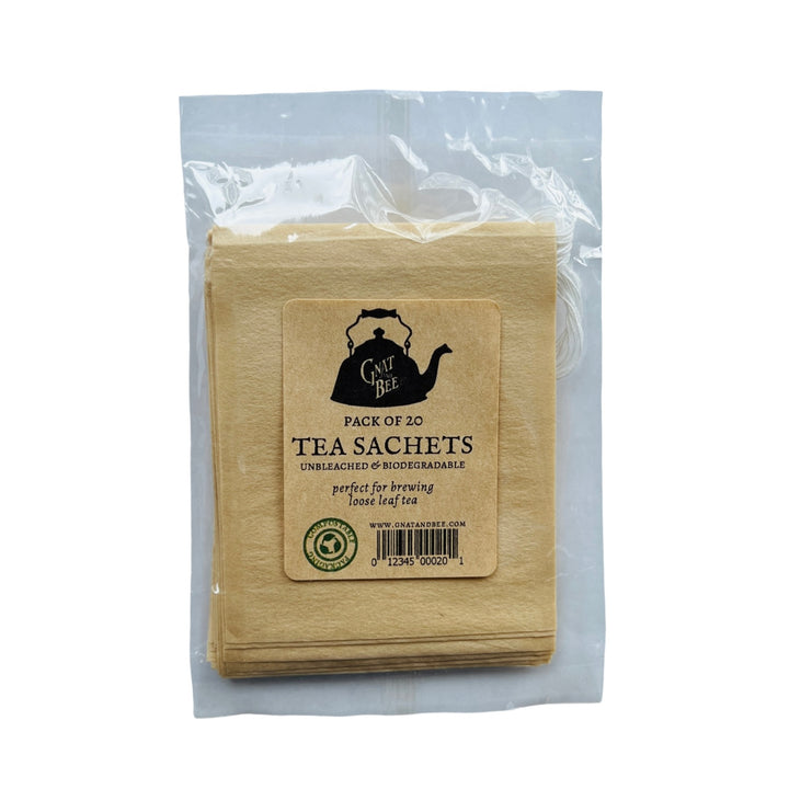clear cellophane bag with 20 kraft tea sachets with an image of a black kettle.