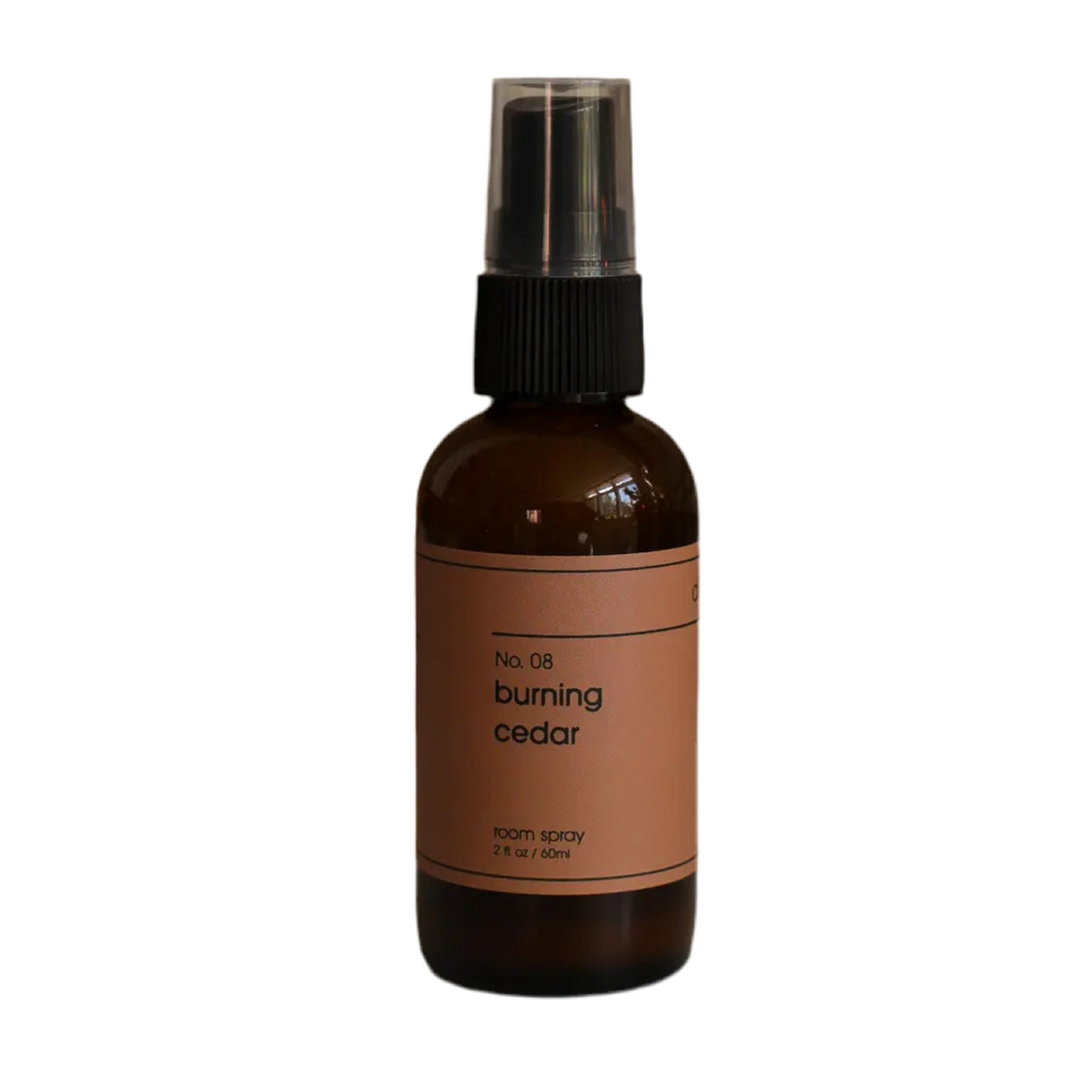Burning Cedar No 8 Room Spray in a dark glass bottle with dilo branded label.
