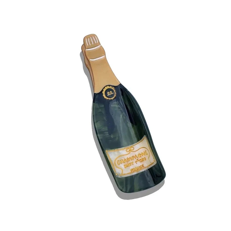 Champagne bottle–shaped claw hair clip with a glossy green and gold finish.